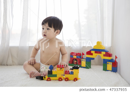 Little two cute babies photo. Baby wearing diaper in white bedroom. 237 47337935
