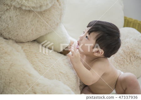 Little two cute babies photo. Baby wearing diaper in white bedroom. 217 Little two cute babies photo. Baby wearing diaper in white bedroom. 217 47337936