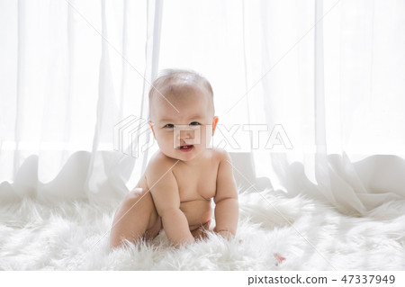 Little two cute babies photo. Baby wearing diaper in white bedroom. 184 Little two cute babies photo. Baby wearing diaper in white bedroom. 184 47337949