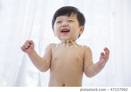 Little two cute babies photo. Baby wearing diaper in white bedroom. 125 Little two cute babies photo. Baby wearing diaper in white bedroom. 125 47337992