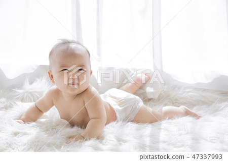 Little two cute babies photo. Baby wearing diaper in white bedroom. 037 Little two cute babies photo. Baby wearing diaper in white bedroom. 037 47337993