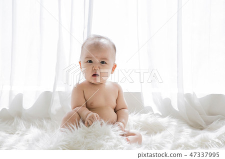 Little two cute babies photo. Baby wearing diaper in white bedroom. 113 Little two cute babies photo. Baby wearing diaper in white bedroom. 113 47337995