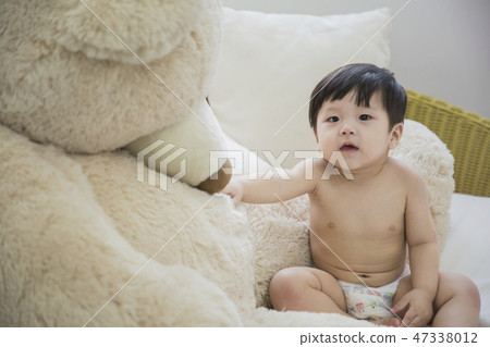 Little two cute babies photo. Baby wearing diaper in white bedroom. 279 Little two cute babies photo. Baby wearing diaper in white bedroom. 279 47338012