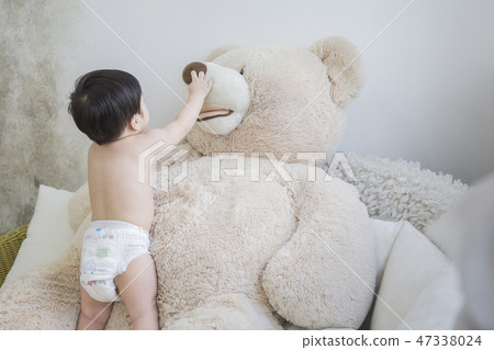 Little two cute babies photo. Baby wearing diaper in white bedroom. 275 Little two cute babies photo. Baby wearing diaper in white bedroom. 275 47338024