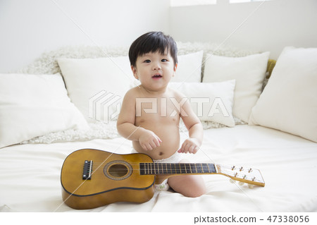 Little two cute babies photo. Baby wearing diaper in white bedroom. 267 Little two cute babies photo. Baby wearing diaper in white bedroom. 267 47338056