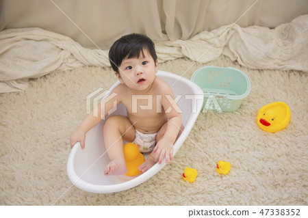Little two cute babies photo. Baby wearing diaper in white bedroom. 153 Little two cute babies photo. Baby wearing diaper in white bedroom. 153 47338352