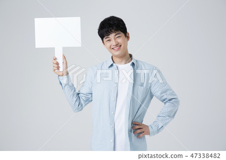 Portrait of a cheerful young man isolated photo 082 47338482