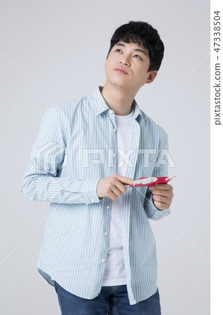 Portrait of a cheerful young man isolated photo 074 47338504