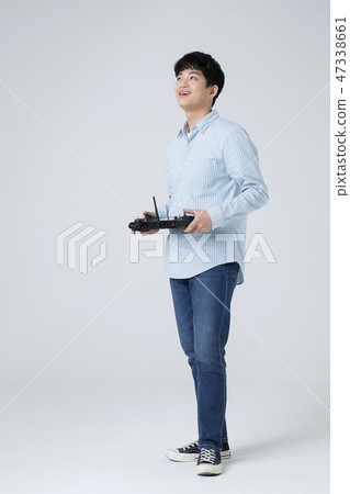 Portrait of a cheerful young man isolated photo 003 47338661