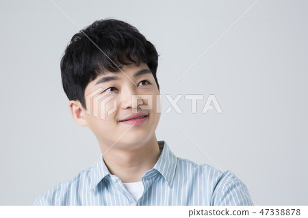Portrait of a cheerful young man isolated photo 006 47338878