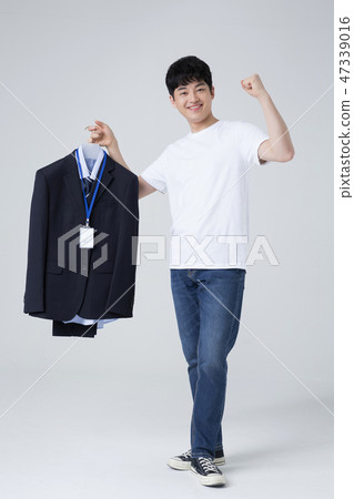 Portrait of a cheerful young man isolated photo 090 47339016