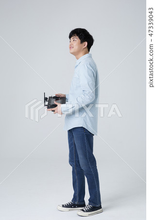 Portrait of a cheerful young man isolated photo 066 47339043