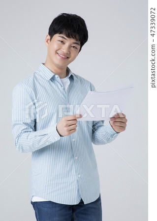 Portrait of a cheerful young man isolated photo 026 47339072