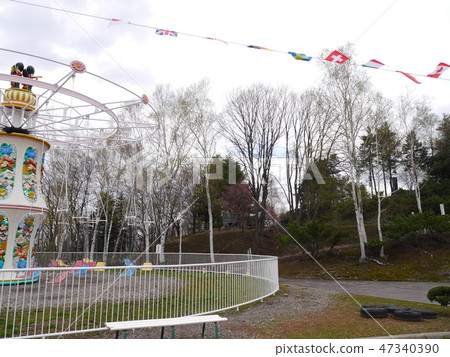 Aerial swing in an amusement park drifting retro atmosphere 47340390