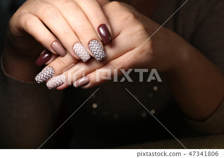 Amazing natural nails. Women's hands with clean manicure 47341806