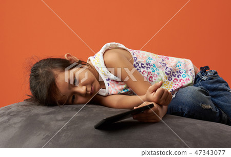 Asian girl sad with phone 47343077