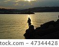 Fisherman at dusk 47344428