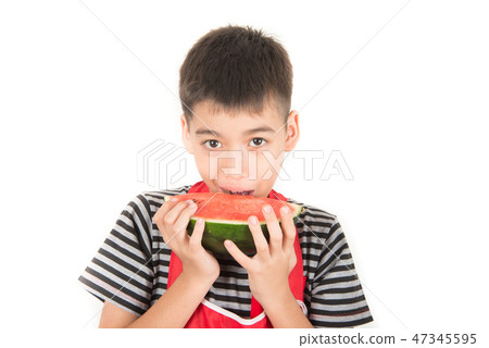 Little boys eat watermelon on white Little boys eat watermelon on white 47345595