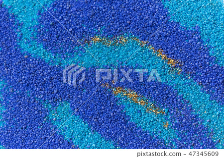 Layered colorful sand pattern. Marble style background. Blue and gold powder texture. Layered colorful sand pattern. Marble style background. Blue and gold powder texture. 47345609