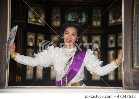 Pretty Thai lady stand posing in railway station. Pretty Thai lady stand posing in railway station. 47347638