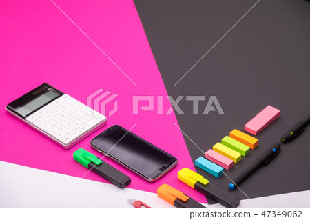 Picture of modern workplace with calculator, markers, stationery and smartphone with copyspace on 47349062