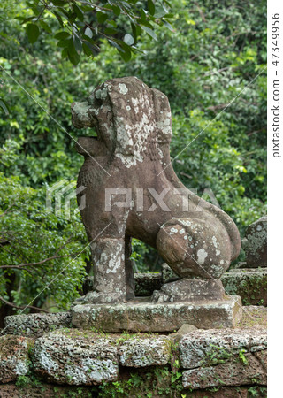 Stone lion guards entrance to East Mebon 47349956