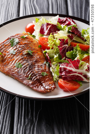 Baked pike fillet served with fresh vegetable Baked pike fillet served with fresh vegetable 47350598