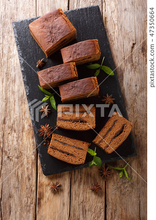 Sliced Polish cake piernik with plum jam close-up Sliced Polish cake piernik with plum jam close-up 47350664