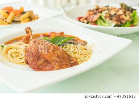 spicy penne with fried duck spicy penne with fried duck 47351618