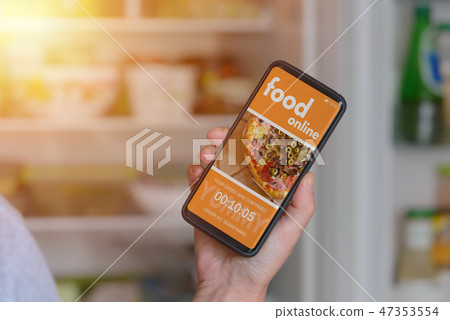 Ordering food online by smartphone Ordering food online by smartphone 47353554