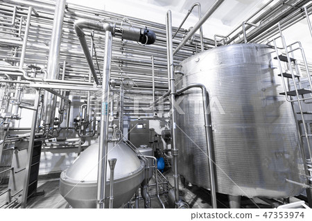 Industrial zone background concept. Equipment, pipelines and cables in factory interior Industrial zone background concept. Equipment, pipelines and cables in factory interior 47353974