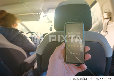 Using smart phone app to rate a taxi driver Using smart phone app to rate a taxi driver 47354076