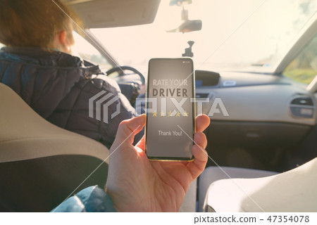 Using smart phone app to rate a taxi driver 47354078