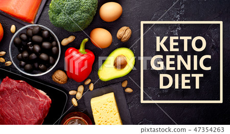 Photo of products for diet on black stone table .Ketogenic diet concept. Photo of products for diet on black stone table .Ketogenic diet concept. 47354263
