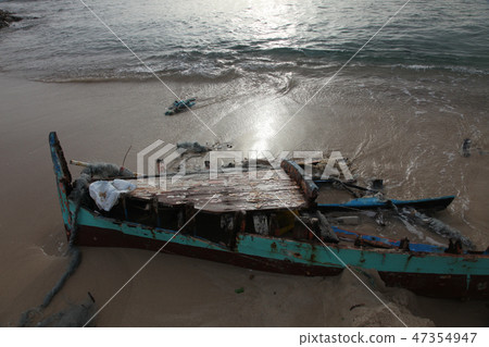 Damaged ship on the beach Damaged ship on the beach 47354947
