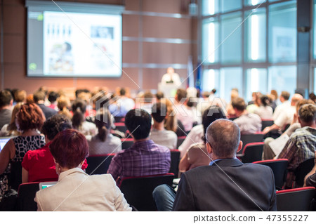 Business speaker giving a talk at business conference event. Business speaker giving a talk at business conference event. 47355227