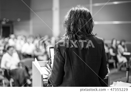 Public speaker giving talk at Business Event. Public speaker giving talk at Business Event. 47355229