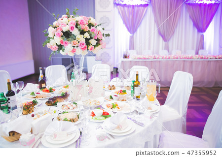 Interior of a restaurant prepared for wedding ceremony Interior of a restaurant prepared for wedding ceremony 47355952