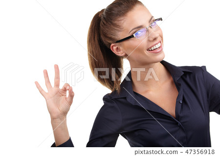 Happy smiling business woman with ok hand sign 47356918