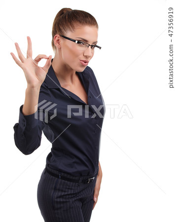 Happy smiling business woman with ok hand sign 47356919