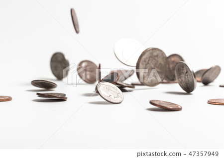 The group of blur fallen coins 47357949