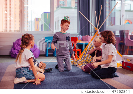 Handsome red-haired boy standing in the middle of room Handsome red-haired boy standing in the middle of room 47362844