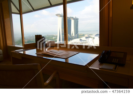 SINGAPORE - JULY 23rd, 2016: luxury Hotel room with modern interior and an awesome view of the 47364159