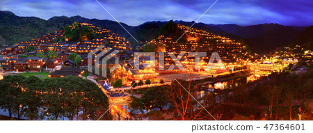 Night view of large ethnic village in Southwest 47364601
