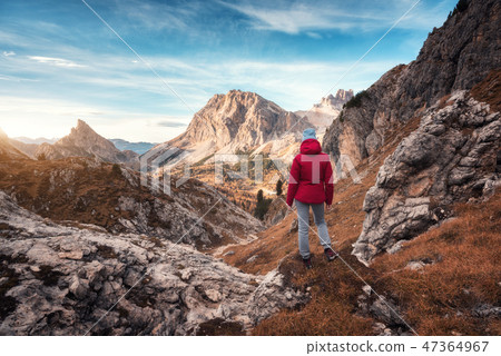 Young woman on the trail looking on mountains Young woman on the trail looking on mountains 47364967