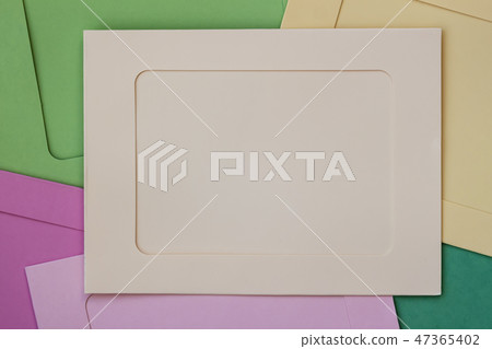 Colored frames with a blank, empty field for your design. Flat lay, top view. Copy space for text Colored frames with a blank, empty field for your design. Flat lay, top view. Copy space for text 47365402
