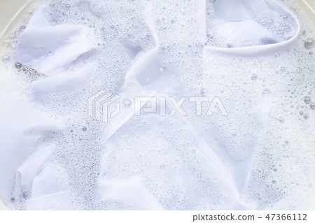 Soak cloth before washing, white shirt Soak cloth before washing, white shirt 47366112