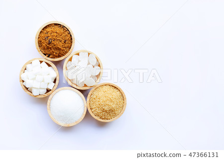 Various types of sugar on white. Various types of sugar on white. 47366131