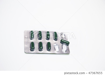 Green capsules medicine 47367655