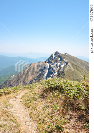 Mountain climbing Mt. Tanigawake in spring (Ikeda Takeake is desired from Ichinokurake) Mountain climbing Mt. Tanigawake in spring (Ikeda Takeake is desired from Ichinokurake) 47367666